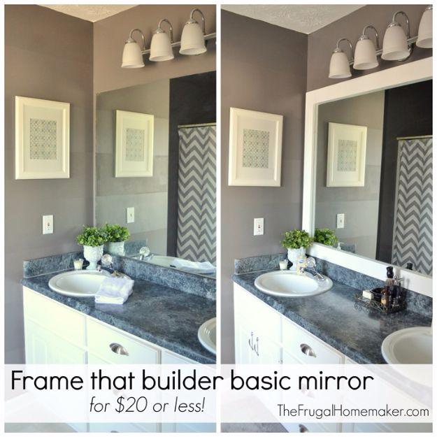 Bathroom mirror before and after being framed with white painted trim boards above a dark granite vanity and white cabinets