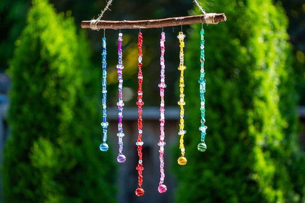 DIY Beaded Wind Chime, quick to put together in an afternoon and a nice way to make a plain corner feel finished