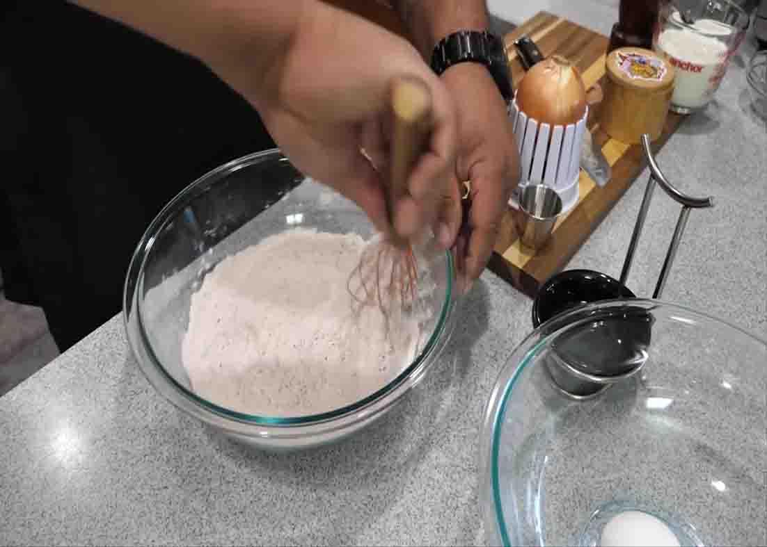 Combining all the dry ingredients for the outback's blooming onion