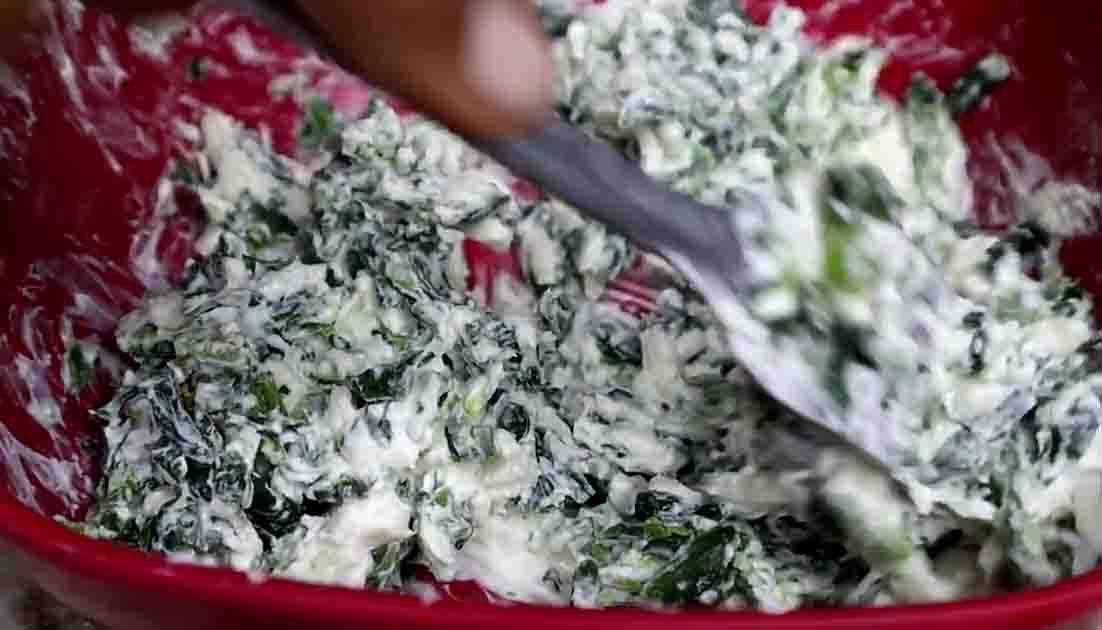 Mixing the stuffing for the chicken breast