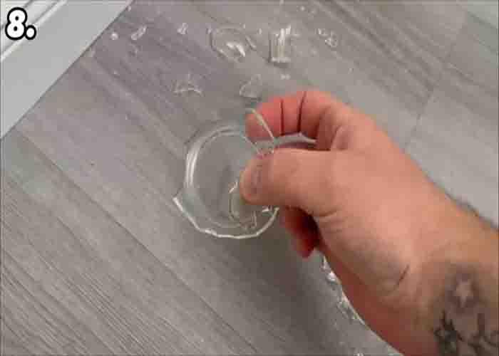 Cleaning small shards of glass using a lint roller