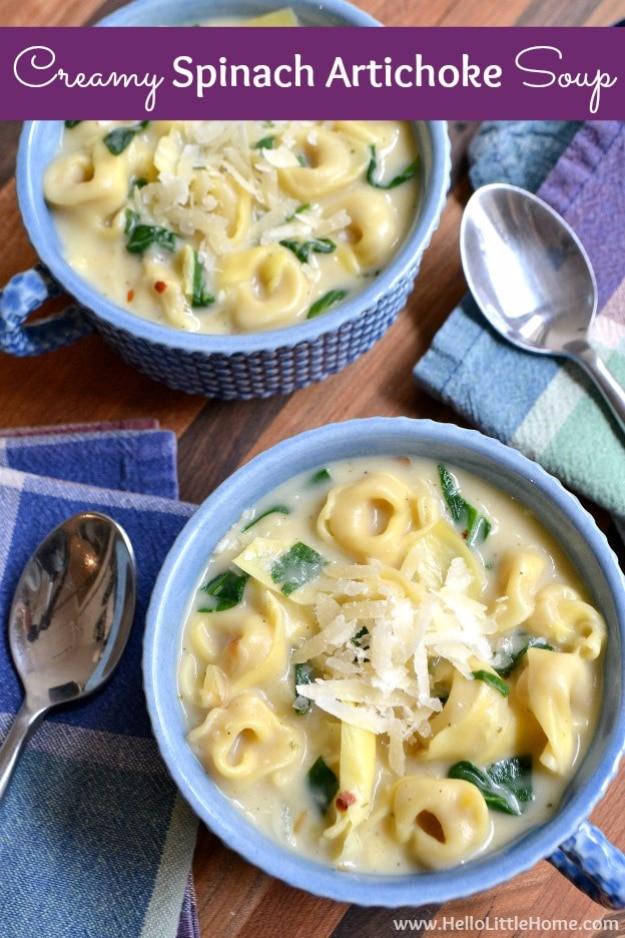 Creamy spinach artichoke soup with cheese tortellini, chopped artichokes and fresh spinach in a bowl