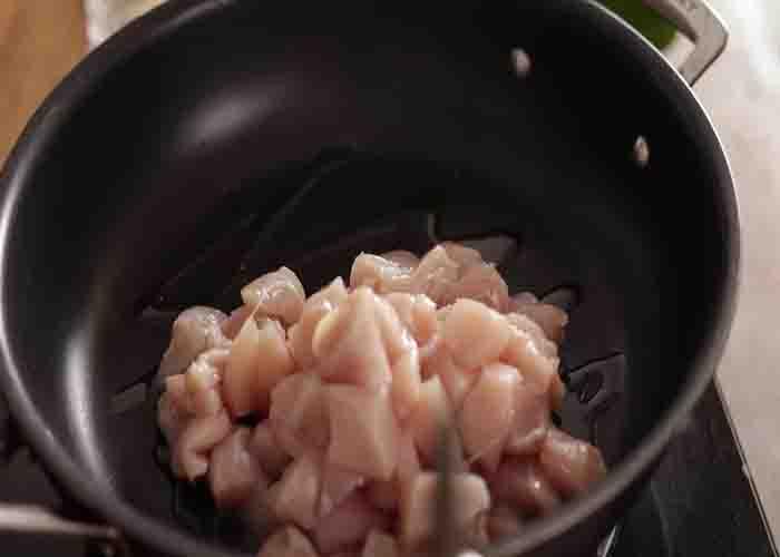 Sauteing the chicken for the buffalo chicken recipe