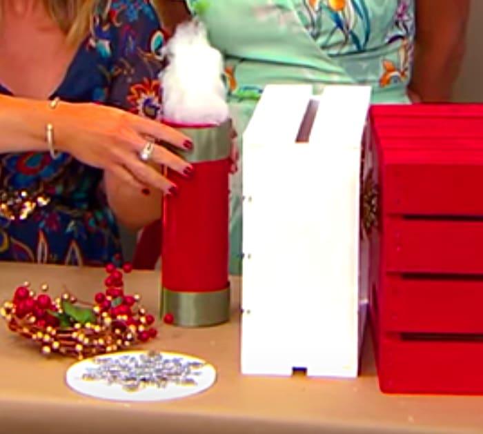 Learn to make a DIY Christmas Crate Train out of craft crates and spray paint