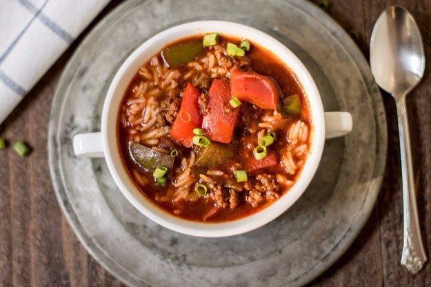Crock pot stuffed pepper soup with ground turkey, bell peppers, tomatoes and brown rice in a bowl, a healthy crockpot recipe