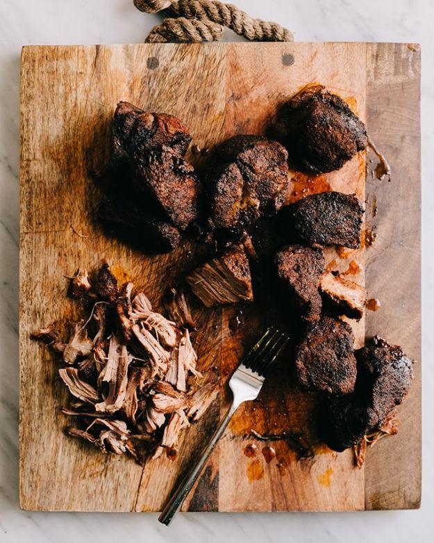 Pulled pork braised in a dutch oven until it shreds, made from a spice rubbed boston butt cut in chunks