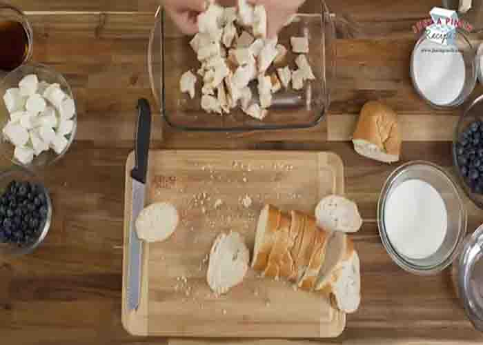 Chopping the French bread for the blueberry French toast casserole