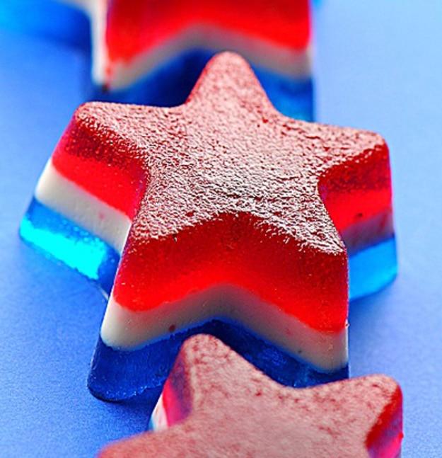 Bomb pop jello shots mixed with a boozy nostalgic twist for the adults at a Fourth of July party for the whole family