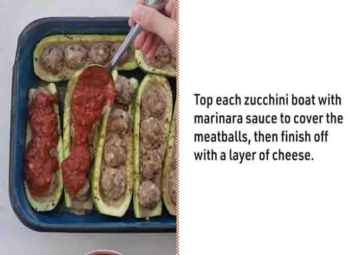 Adding some marinara sauce over the zucchini