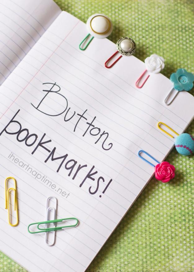 A vintage button on thin black elastic, stretched around a worn paperback book lying on a bedside table