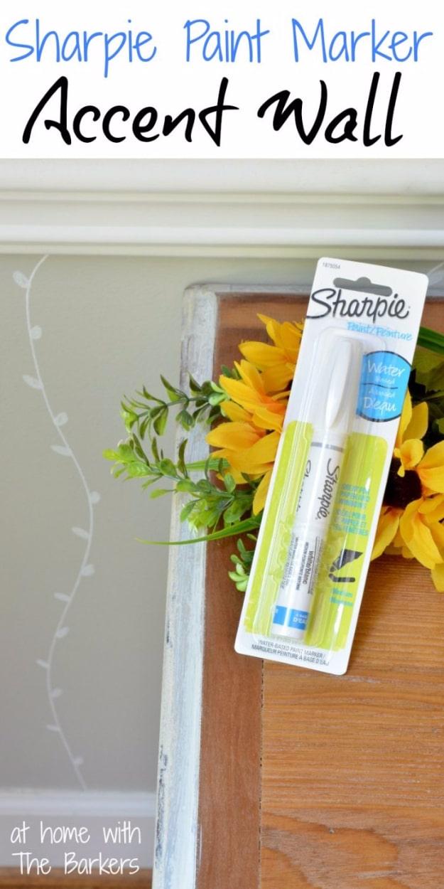 Sharpie paint marker accent wall graphic, a pale wall drawn with a fine wave pattern beside a packaged paint marker