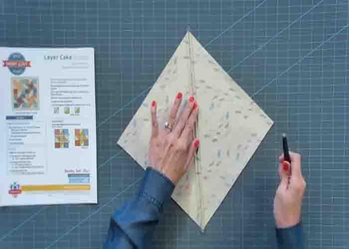 Making the half-square triangles for the layer cake shake quilt