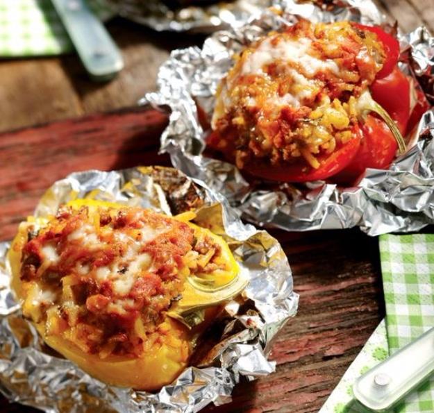Camping recipe: stuffed peppers sealed into a foil packet and grilled for an easy no mess campfire dinner