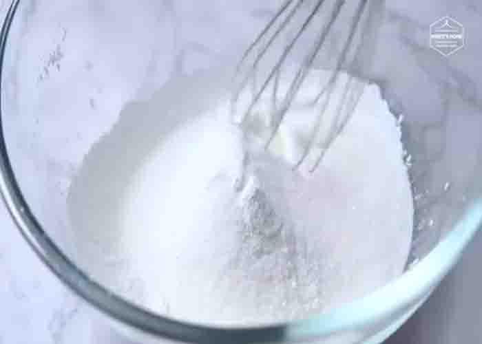 Mixing all the ingredients for the milk balls
