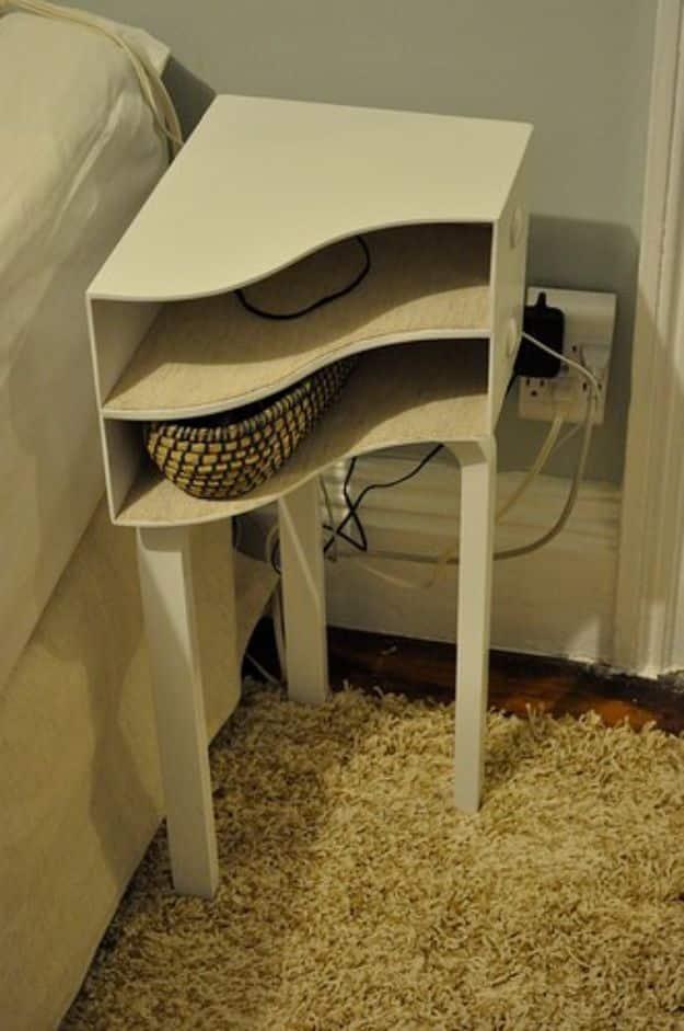 Nightstand from Magazine Holders, a budget friendly way to furnish a bedroom and a stylish accent piece beside the bed