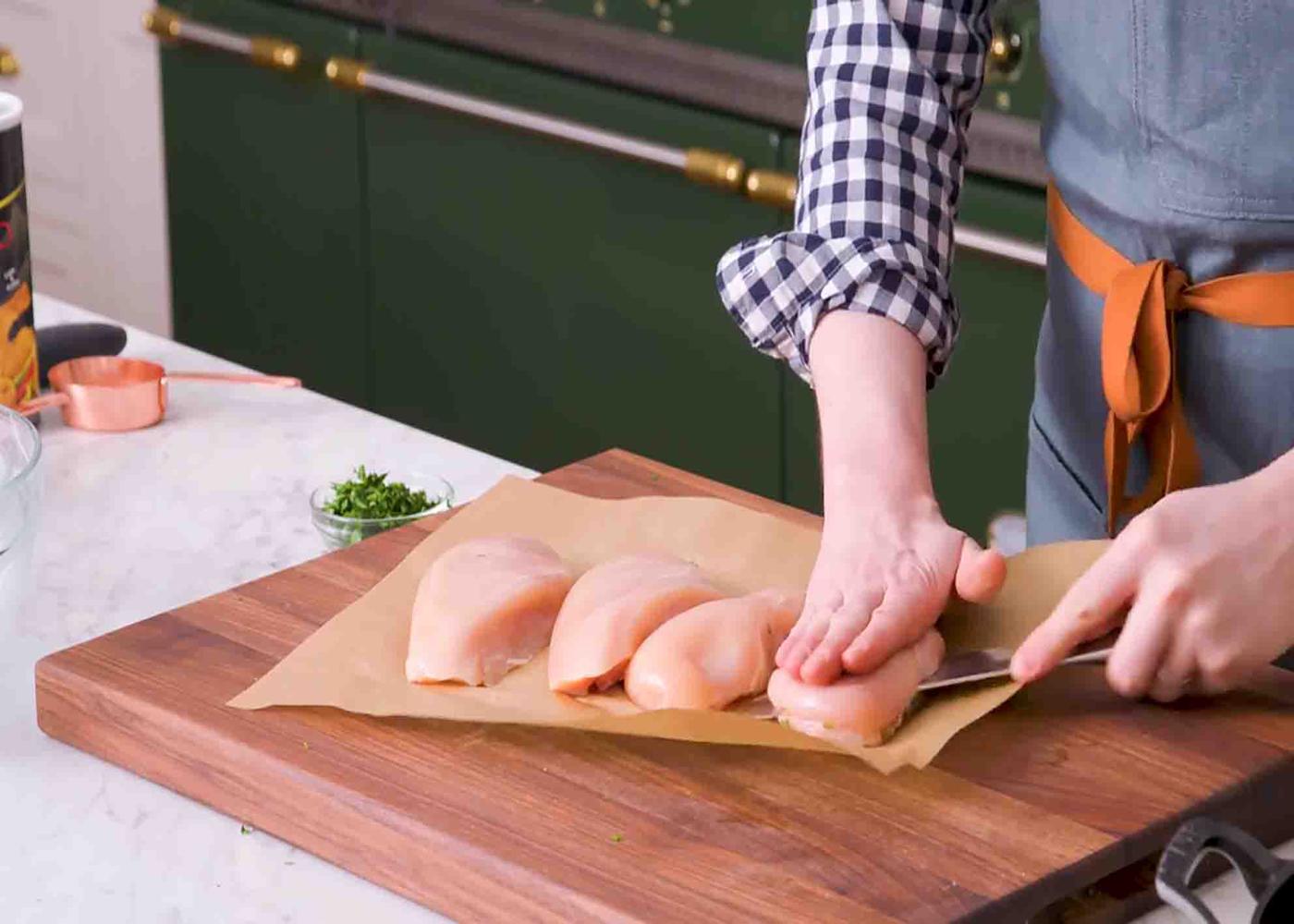 Cutting the chicken down the middle