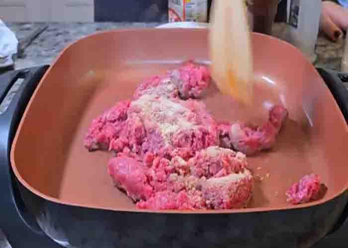 Browning the ground beef for the one-pan beef and rice enchilada