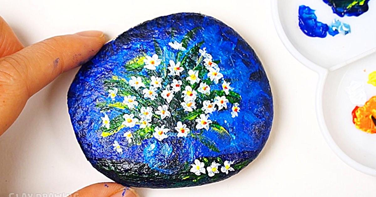 Rock Painting Idea with Blue and White Flowers