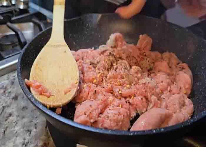 Cooking the Italian sausage for the zucchini casserole