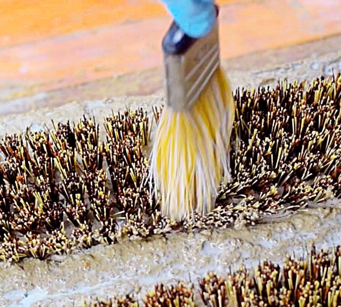 Learn to make a DIY cement boot brush mat for the doorway