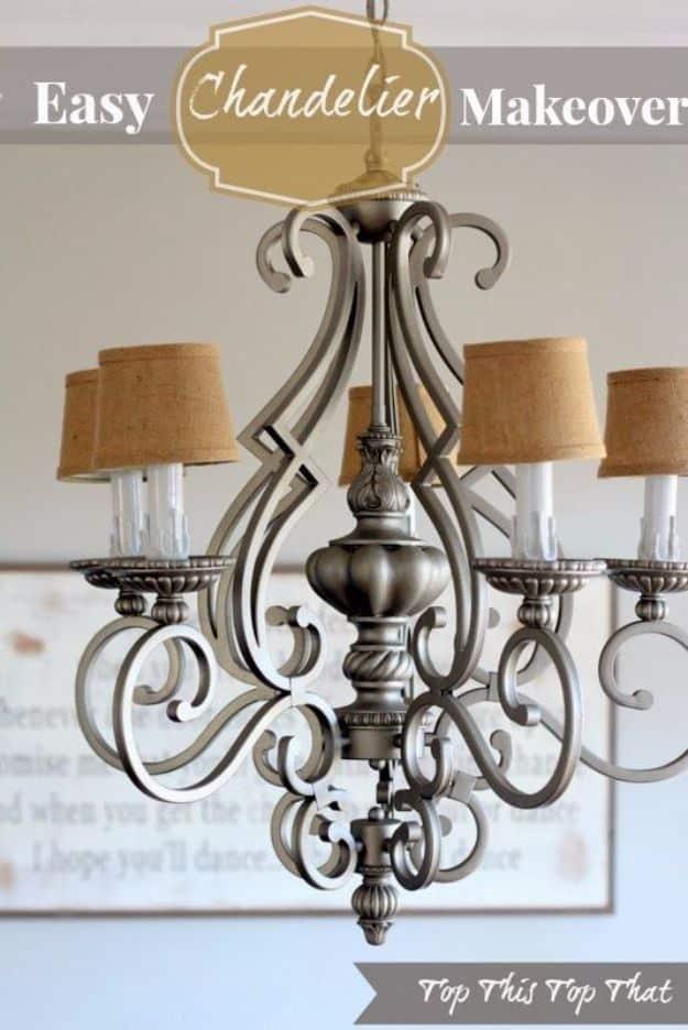 Chandelier makeover sprayed satin nickel with five burlap drum shades, mounted on a scrolled frame in a bright room