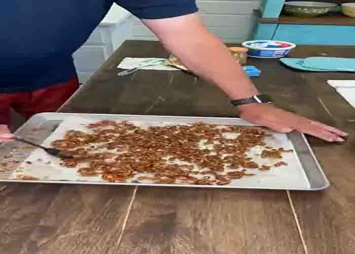 Assembling the caramel apple pretzel salad