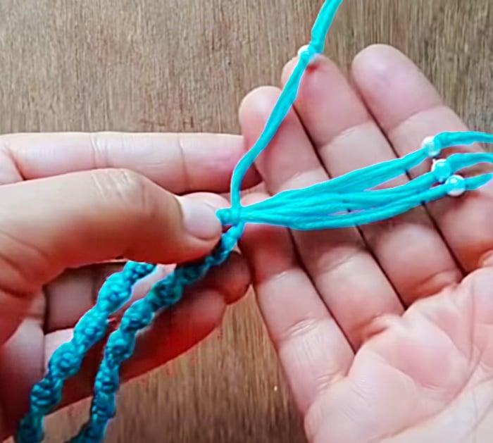 Add beads to a macrame bra