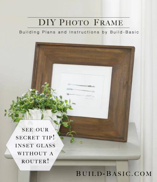 DIY wood photo frame with mitered corners and inset glass, shown on a white chair beside a small plant