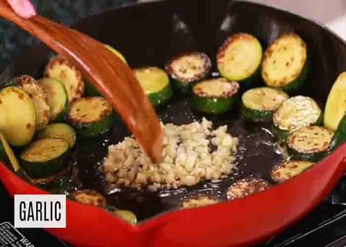 Sauteeing the garlic for the sauteed zucchini recipe