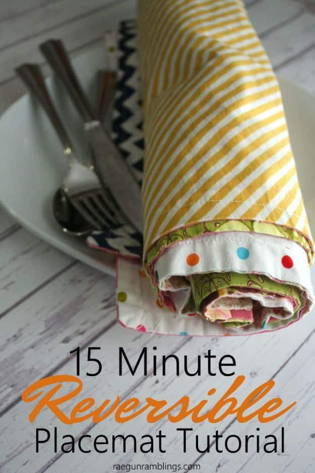 Fifteen minute reversible placemat graphic, a rolled yellow striped placemat with floral reverse beside cutlery and a plate