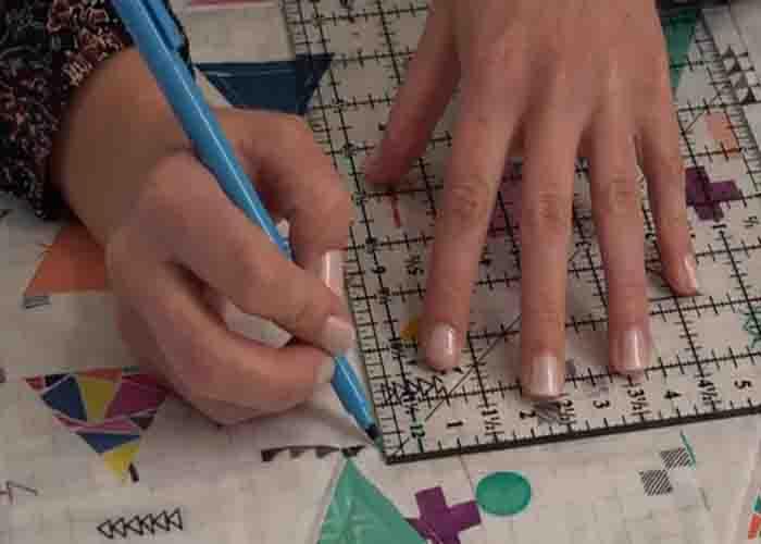 Marking the quilt using a pen