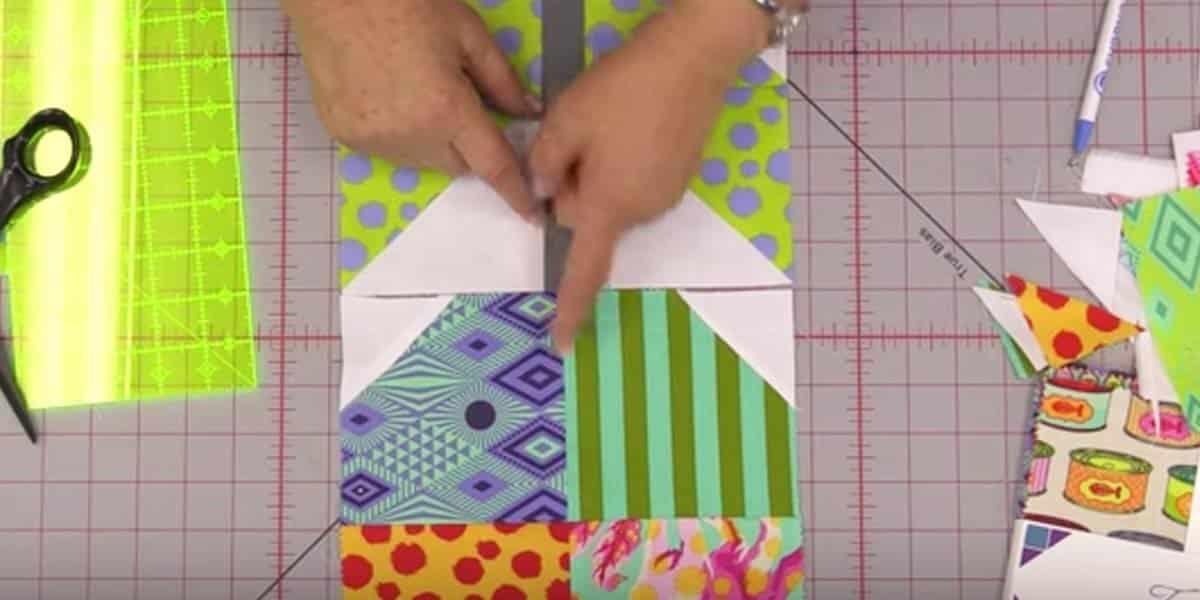 Use Fabric Blocks Like A Puzzle To Make This Tulip Quilt
