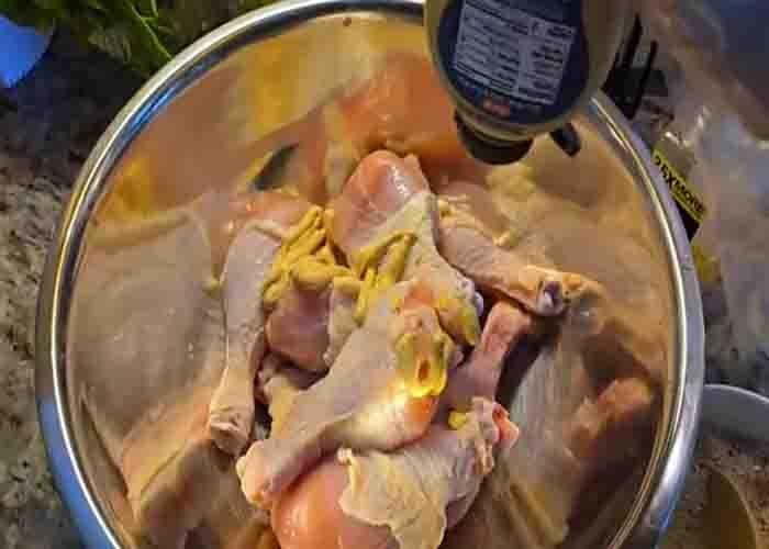 Seasoning the chicken drumsticks