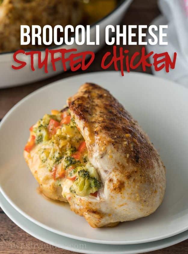 Broccoli cheese stuffed chicken breast cut open with melted cheddar, broccoli and red pepper filling
