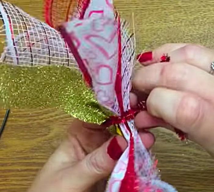 Make a cute cheap DIY Mesh Wreath with materials from Dollar Tree