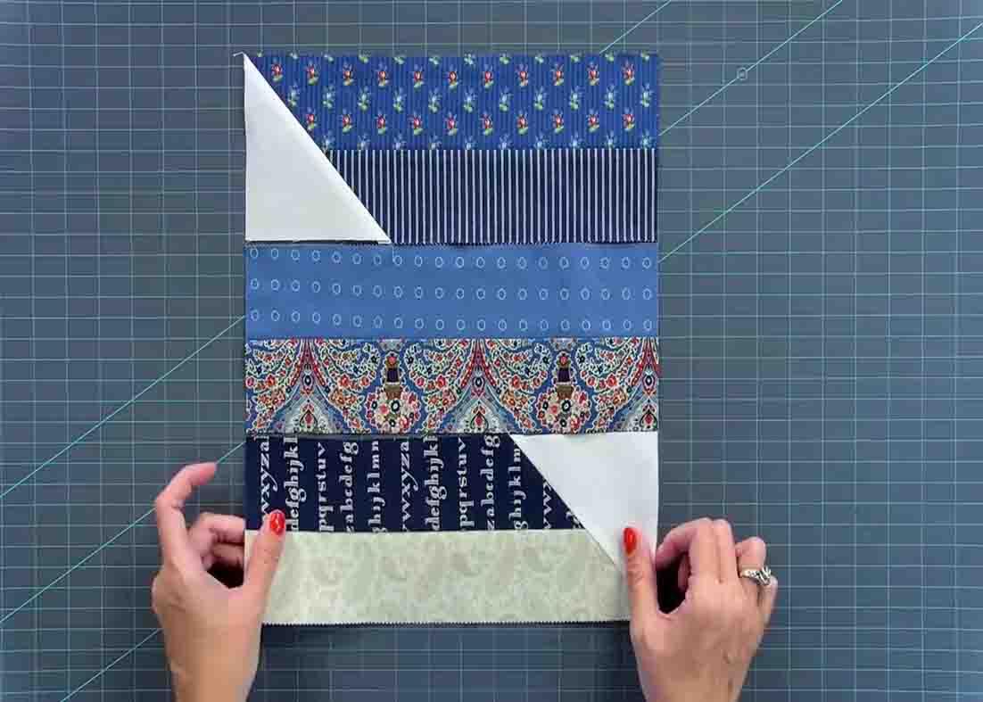 Laying the blocks for the jelly roll baby quilt