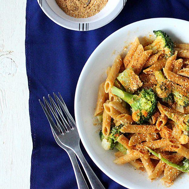 Penne and broccoli in a creamy homemade Dorito spiced sauce topped with seasoned breadcrumbs in a bowl