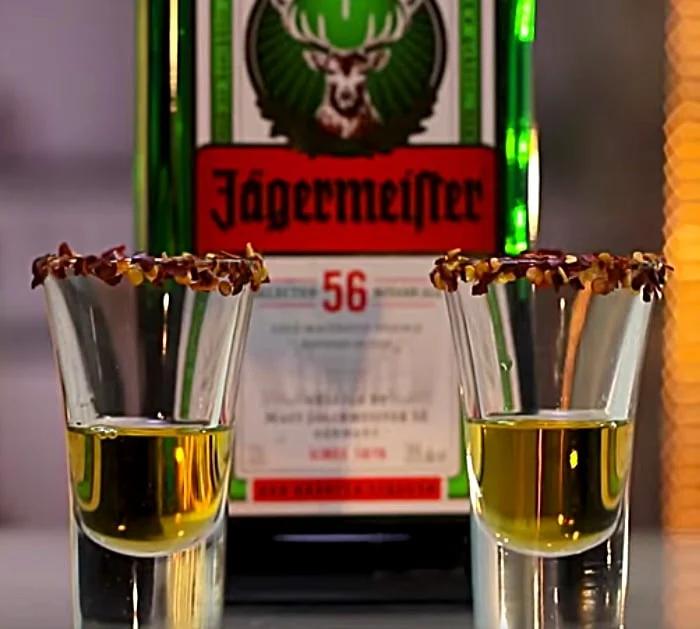 Learn to make a flaming German Shot with jagermeister, 151 Bacardi, and Fireball