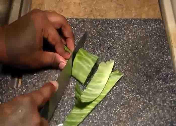 Chopping the cabbage into bite-size pieces