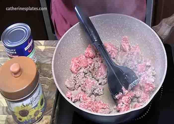 Cooking the ground beef for the taco spaghetti casserole