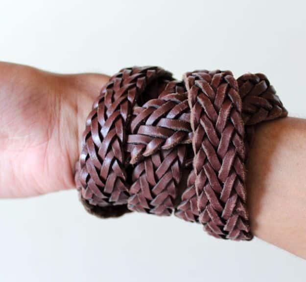 A braided brown leather belt upcycled into a wrap bracelet on a wrist, a handmade Valentine gift for him