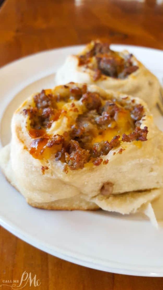 Sausage and cheddar breakfast pinwheels baked in a dutch oven over charcoal briquettes on a camping trip