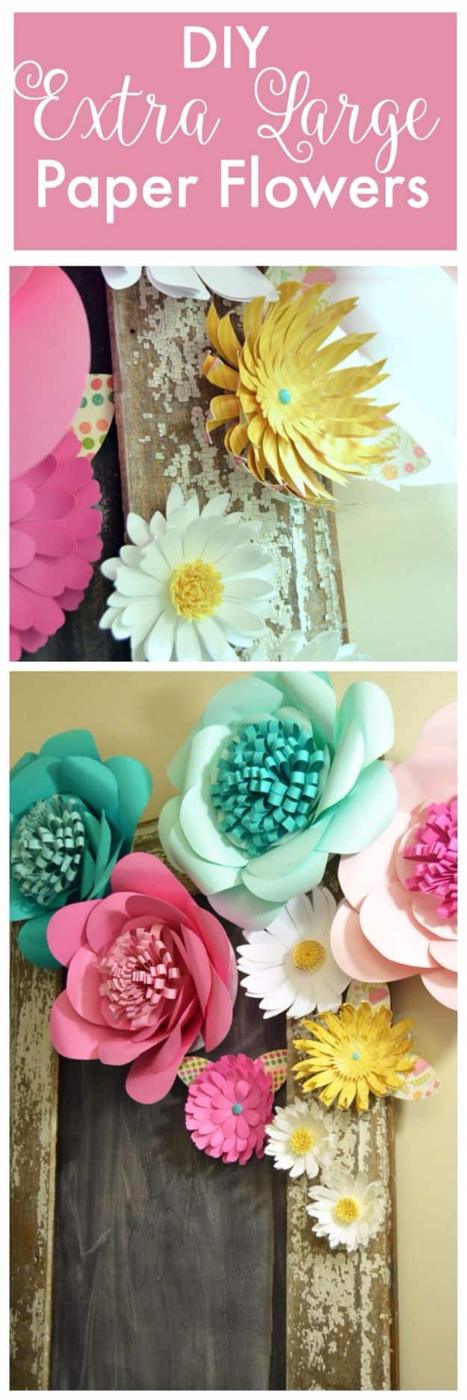 Extra large paper flowers, oversized yellow, pink, teal and cream paper flowers mounted on gray barn wood