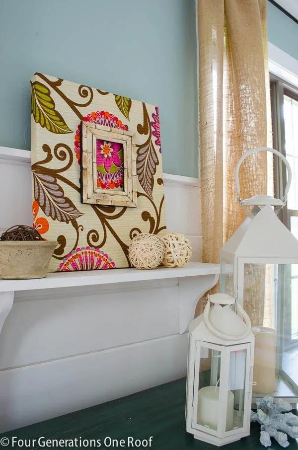 Fabric-covered canvas wall art stretched over a frame, an easy DIY home decor craft that sells at craft fairs and on Etsy