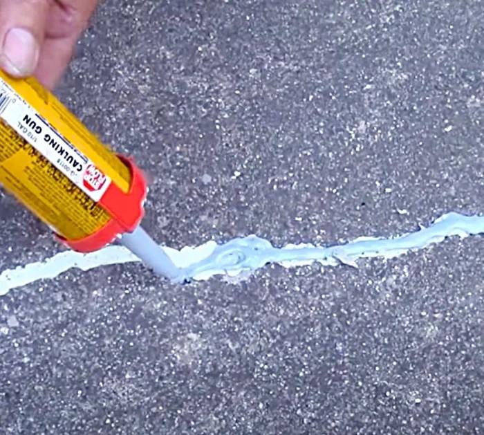 Caulk cracks in your cement driveway or sidewalk