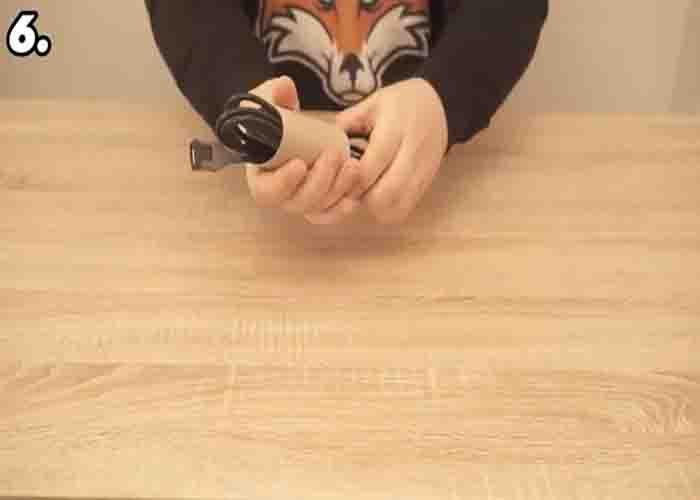 Storing rolled-up cables in a toilet paper tube