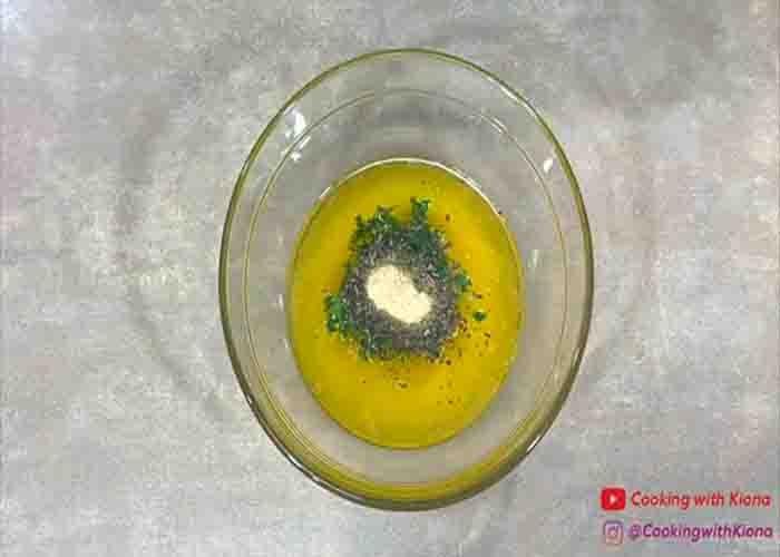 Making the garlic butter for the French bread pizza recipe