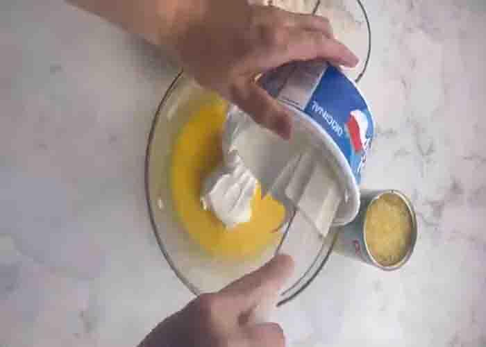 Mixing all the ingredients for the pina colada fluff