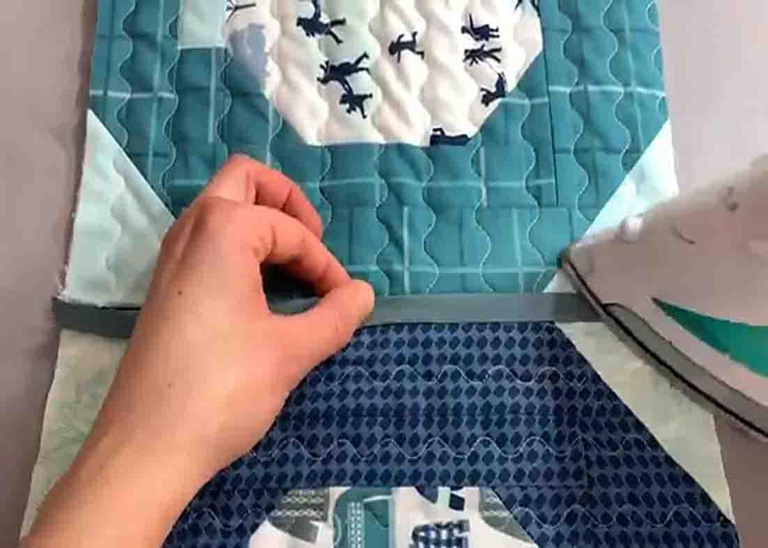 Joining quilt-as-you-go blocks with binding strip method