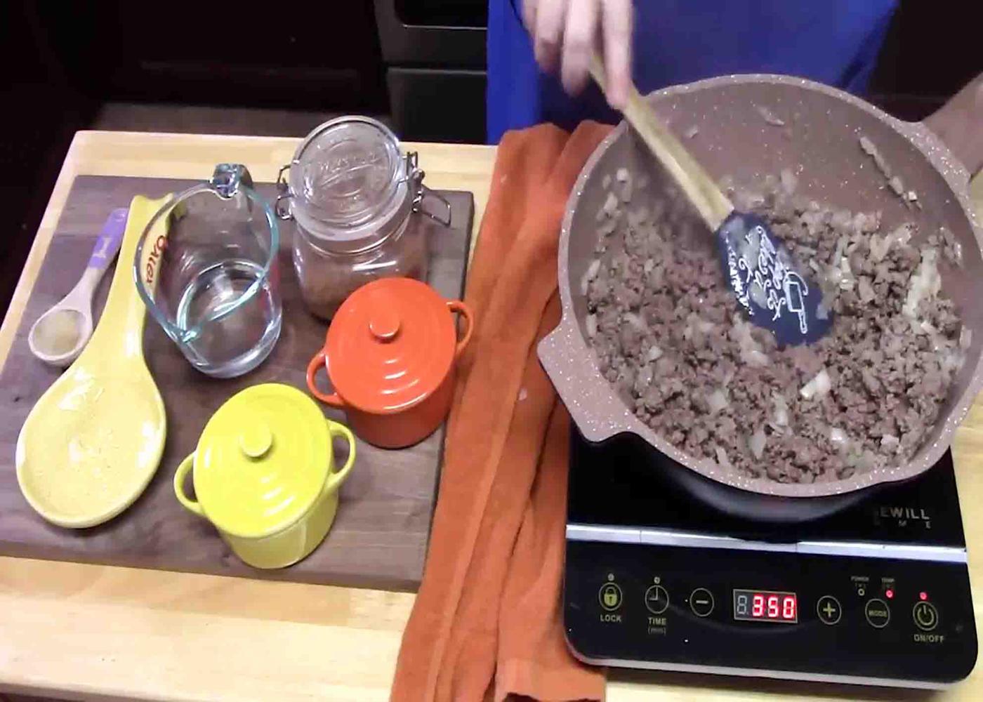 Cooking the ground beef for the crunchwraps